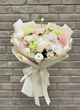 Букет цветов из:  Гвоздики, Розы, Лизиантусы и Хризантемы в Нурма